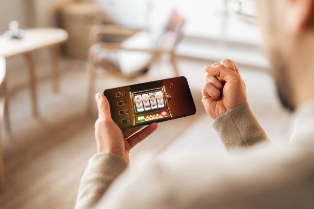 hokiwin apk game library showing live-dealer tables, slots, and sports markets